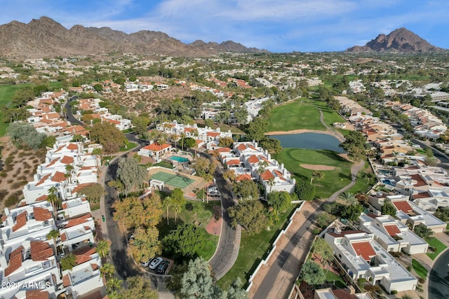 aerial view featuring a water and mountain view