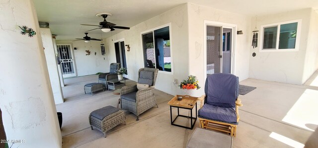 view of patio with ceiling fan