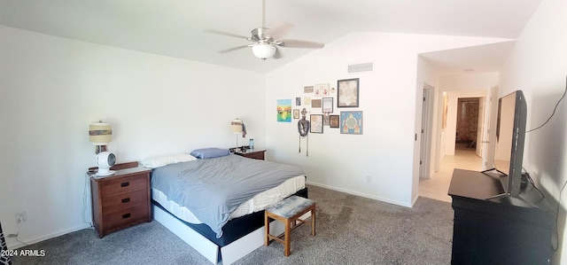 bedroom with vaulted ceiling, carpet floors, and ceiling fan