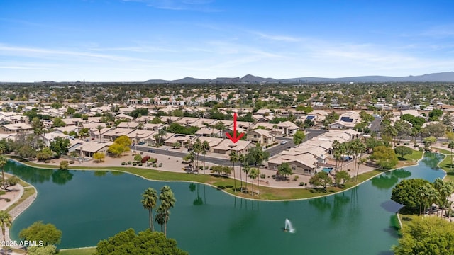 aerial view featuring a residential view and a water and mountain view