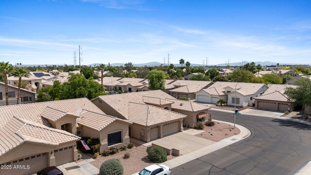 bird's eye view featuring a residential view and a mountain view