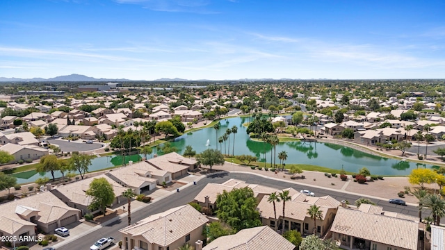 bird's eye view with a residential view and a water and mountain view