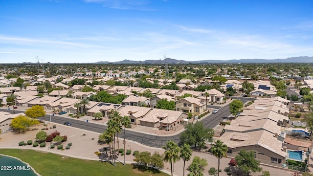 drone / aerial view featuring a mountain view and a residential view
