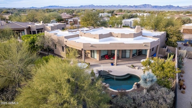 bird's eye view with a mountain view