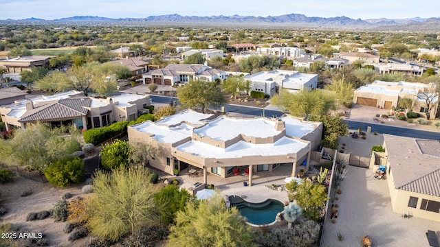 bird's eye view with a mountain view