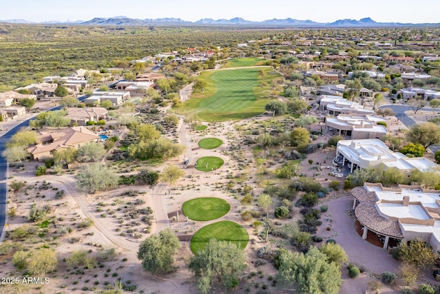 birds eye view of property featuring a mountain view