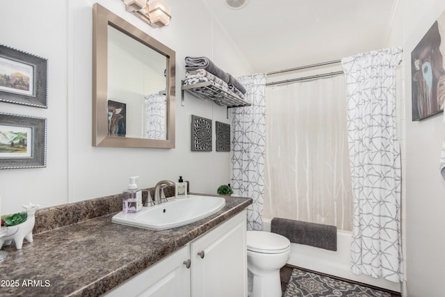 full bath featuring shower / bath combination with curtain, vanity, and toilet