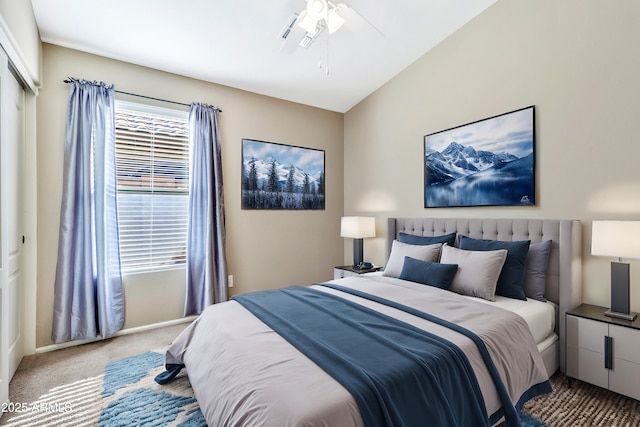 carpeted bedroom with ceiling fan and a closet