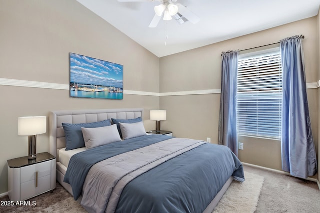 carpeted bedroom featuring ceiling fan and lofted ceiling