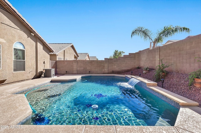 view of swimming pool featuring central air condition unit and pool water feature