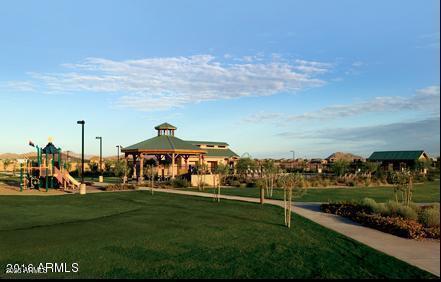 view of home's community featuring a gazebo, a playground, and a yard