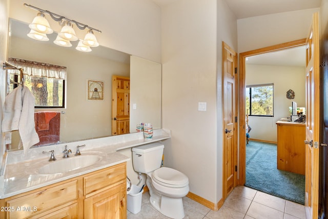 2761 Jaguar Cir, Overgaard, AZ 85933 - bathroom with vanity, toilet, tile patterned flooring, and baseboards