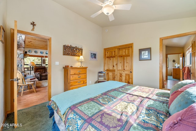 2761 Jaguar Cir, Overgaard, AZ 85933 - carpeted bedroom with lofted ceiling and ceiling fan