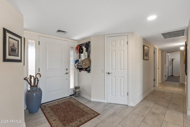 foyer entrance featuring a wealth of natural light