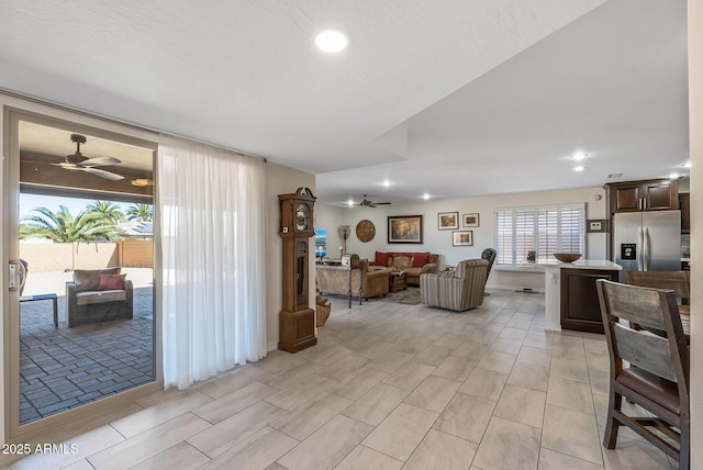 living room featuring ceiling fan