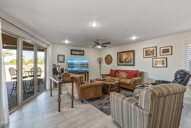 tiled living room featuring ceiling fan