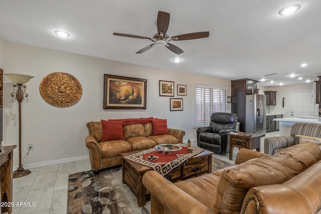 tiled living room with ceiling fan