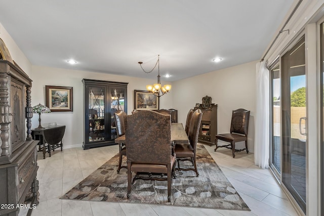 dining room with a chandelier