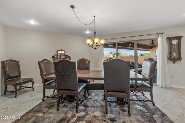 dining room featuring light tile patterned floors and an inviting chandelier