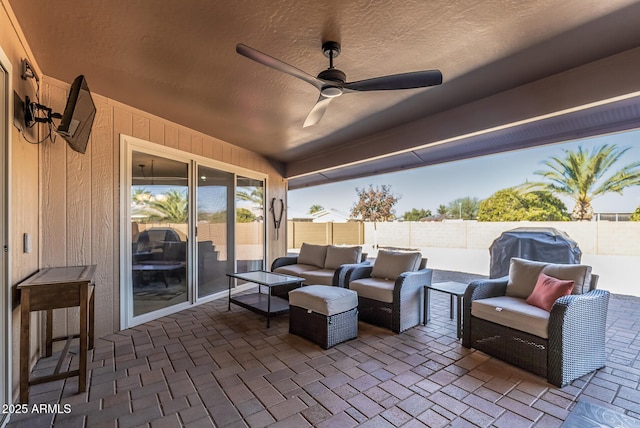 view of patio / terrace with grilling area, ceiling fan, and an outdoor hangout area