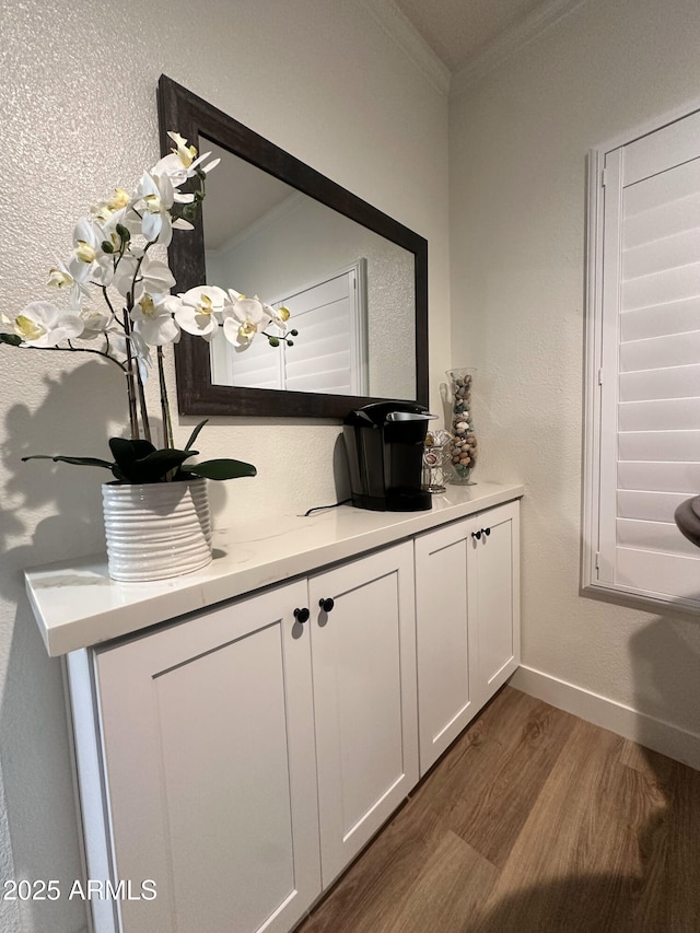 5345 E Van Buren St Unit 216, Phoenix, AZ 85008 - detailed view of crown molding and wood finished floors