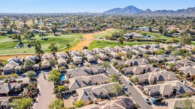 birds eye view of property featuring a mountain view