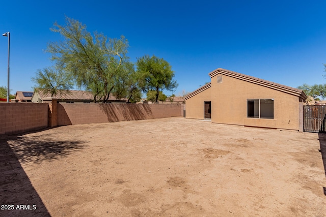 view of yard featuring a fenced backyard