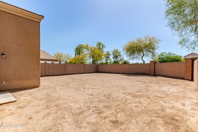view of yard featuring a fenced backyard