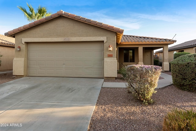 view of front of home featuring a garage