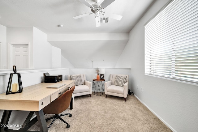 office area featuring ceiling fan, light colored carpet, and vaulted ceiling