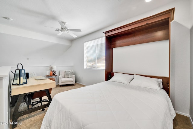 carpeted bedroom featuring ceiling fan