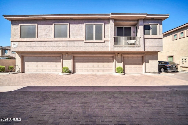 view of property featuring a balcony