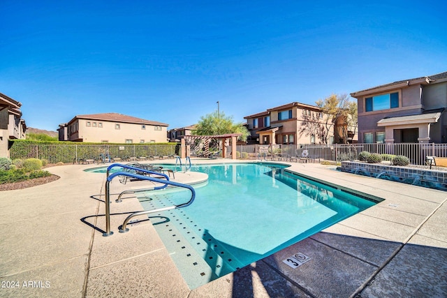 view of pool featuring a patio