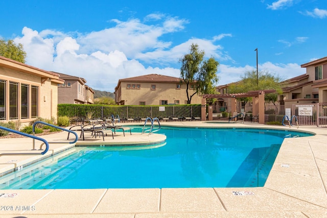 view of pool with a pergola