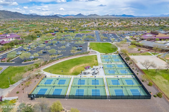 birds eye view of property with a mountain view