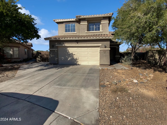 view of front of property with a garage