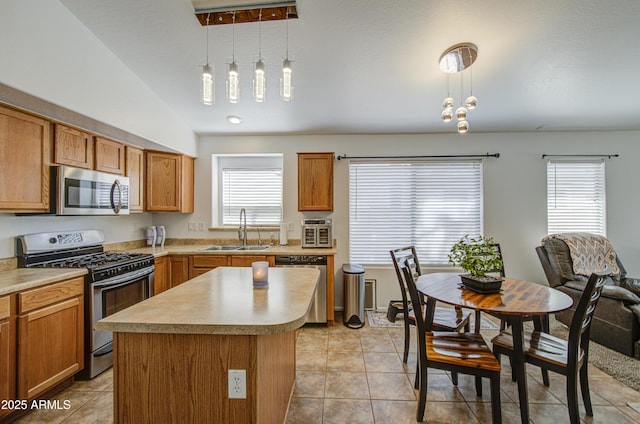 4369 E Coal St, San Tan Valley, AZ 85143 - kitchen featuring stainless steel appliances, healthy amount of natural light, hanging light fixtures, and a center island