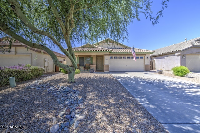 4369 E Coal St, San Tan Valley, AZ 85143 - view of front of home with an attached garage, stucco siding, driveway, covered porch, and a tiled roof
