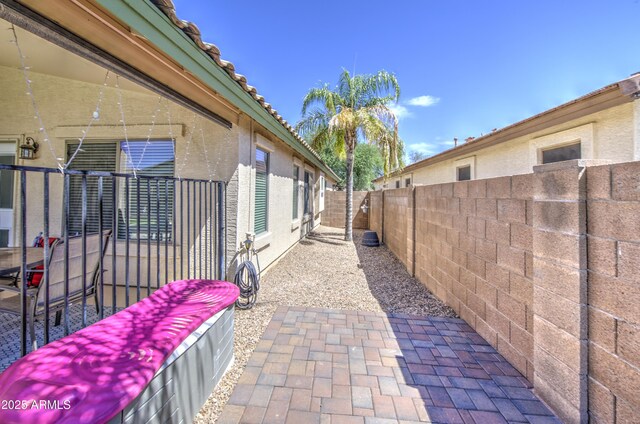 4369 E Coal St, San Tan Valley, AZ 85143 - fenced backyard with a patio area