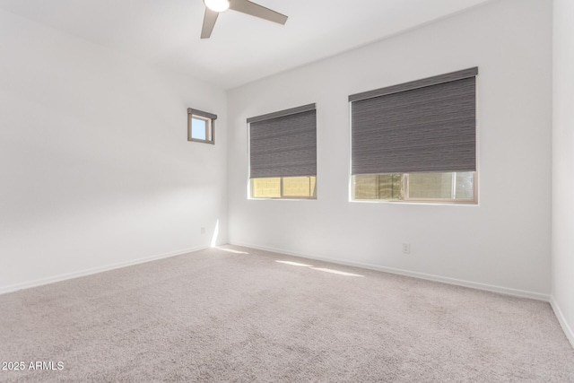 20499 W Alsap Rd, Buckeye, AZ 85396 - carpeted spare room with a ceiling fan and baseboards