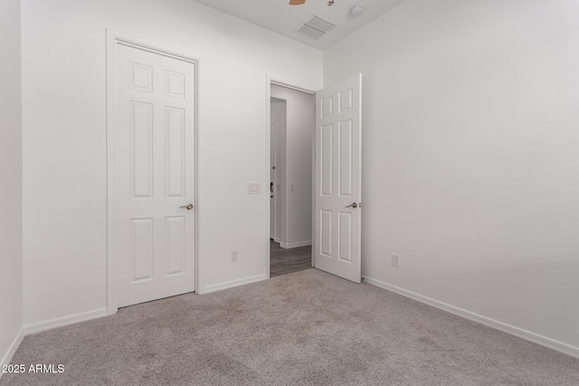 20499 W Alsap Rd, Buckeye, AZ 85396 - unfurnished bedroom with carpet and baseboards