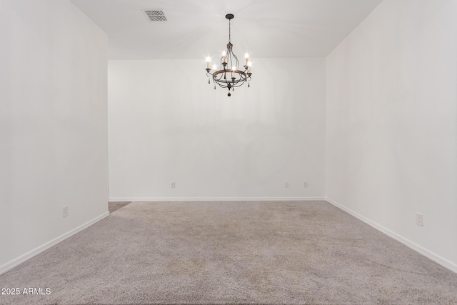 20499 W Alsap Rd, Buckeye, AZ 85396 - carpeted spare room featuring a chandelier and baseboards