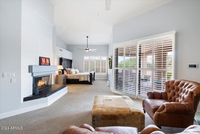 carpeted bedroom with lofted ceiling