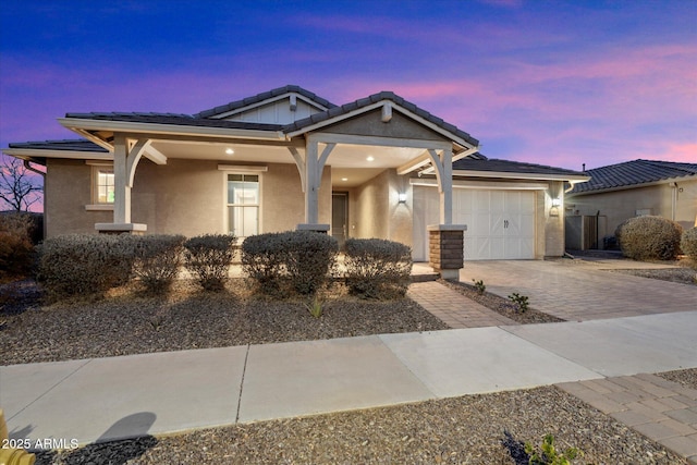 view of front of home with a garage