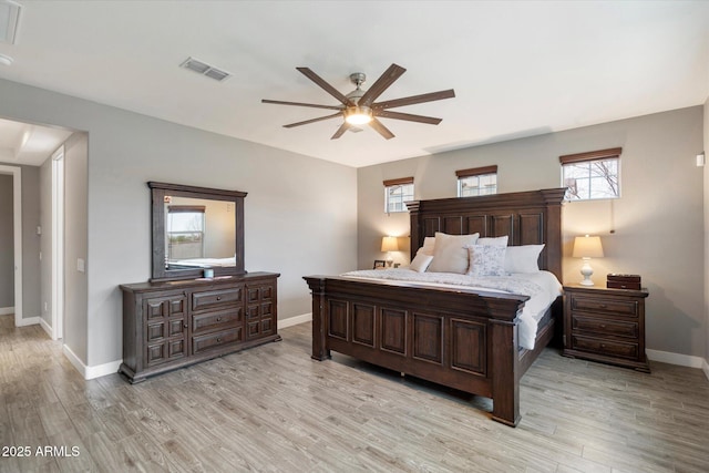 10702 E Sheffield Dr, Mesa, AZ 85212 - bedroom with light hardwood / wood-style floors and ceiling fan