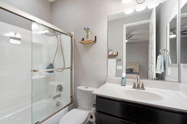 10702 E Sheffield Dr, Mesa, AZ 85212 - full bathroom featuring ceiling fan, vanity, toilet, and combined bath / shower with glass door