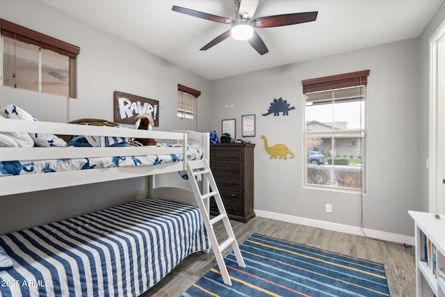 10702 E Sheffield Dr, Mesa, AZ 85212 - bedroom featuring ceiling fan and wood-type flooring