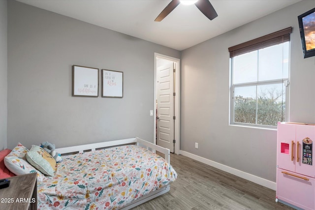 10702 E Sheffield Dr, Mesa, AZ 85212 - bedroom featuring ceiling fan and wood-type flooring