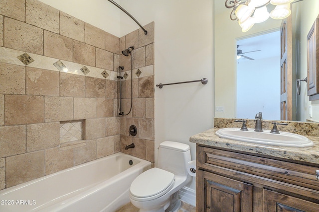 bathroom with toilet, shower / bathing tub combination, and vanity