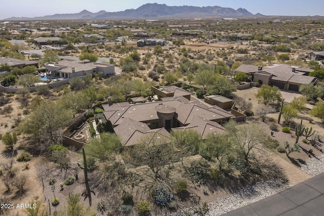 bird's eye view with a mountain view